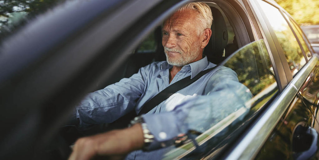 Elderly man driving calm